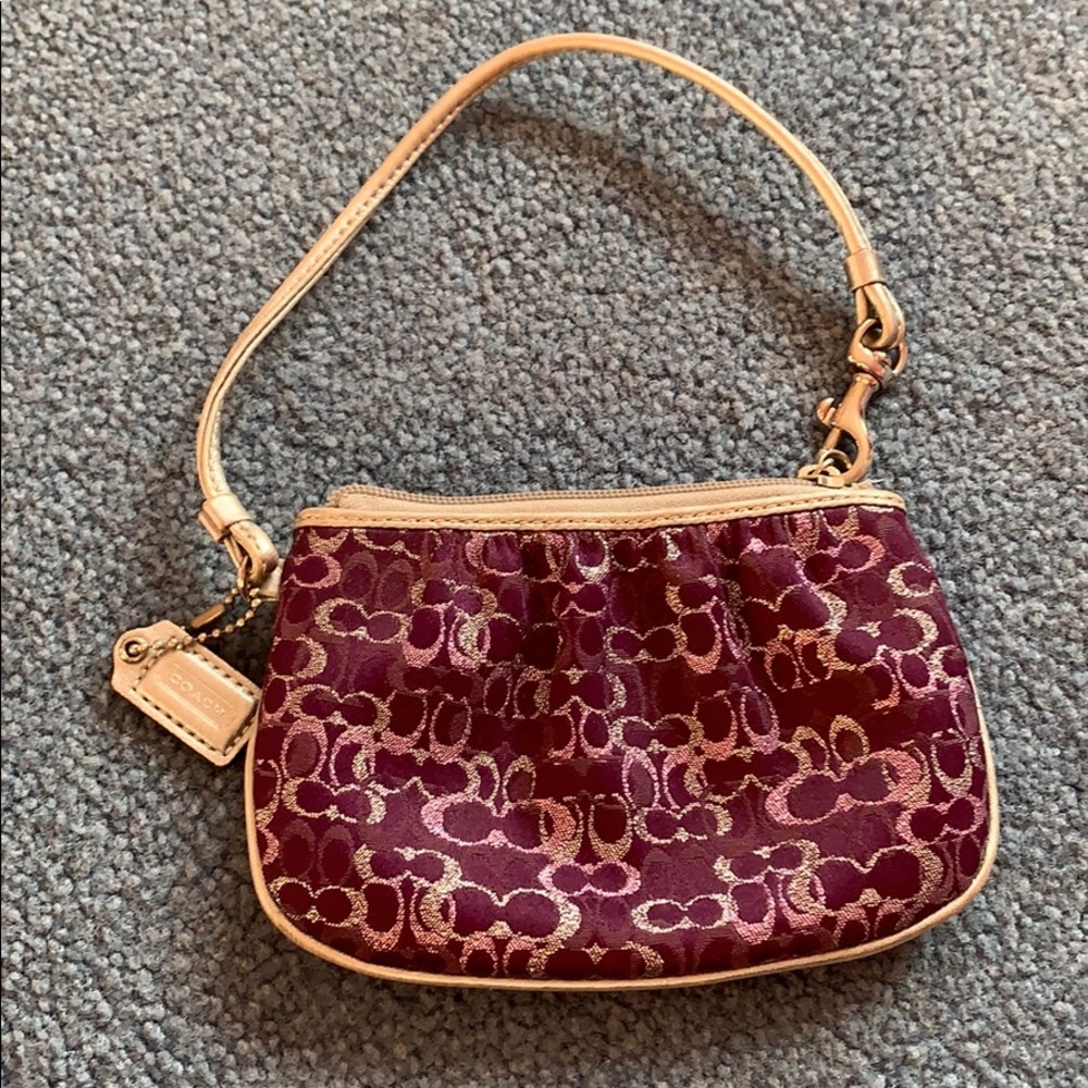 Purple and Silver Coach Wristlet in new condition